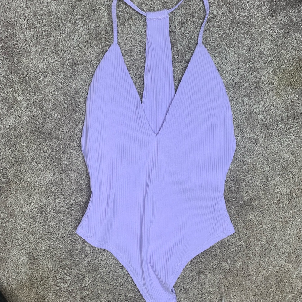 Lilac onesie with ripped design